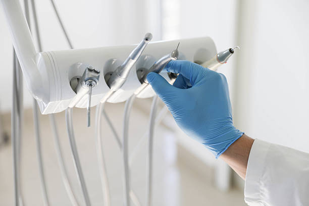 Professional Tooth Extraction technician working in Plum Grove, TX